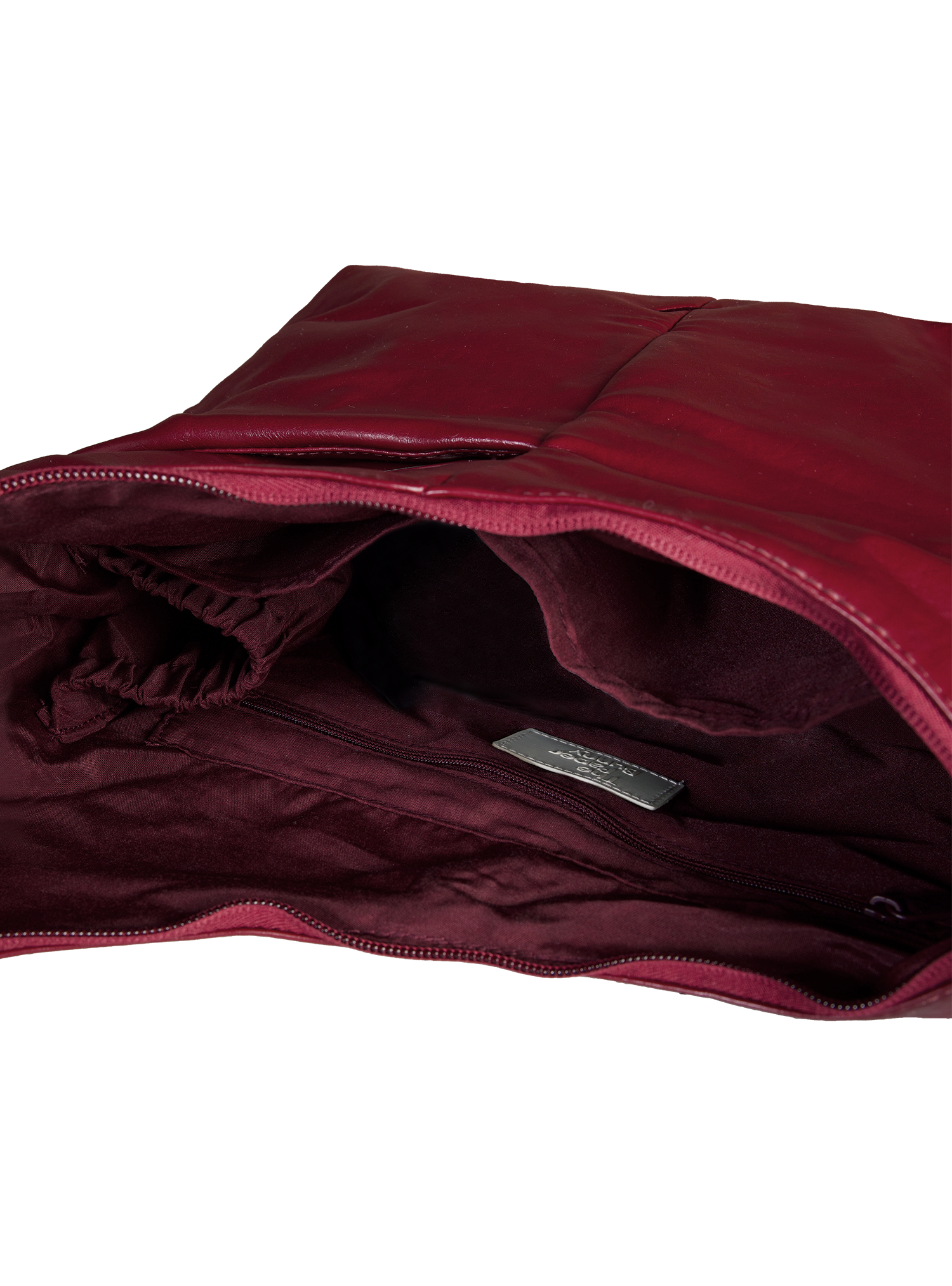 Interior of the Midi Arc hobo-style bag in wine red vegan leather, with multiple pockets and a bottle holder